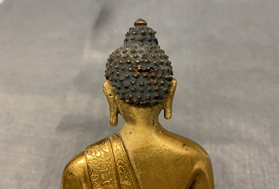 A Chinese gilt bronzen figure of Buddha, Kangxi